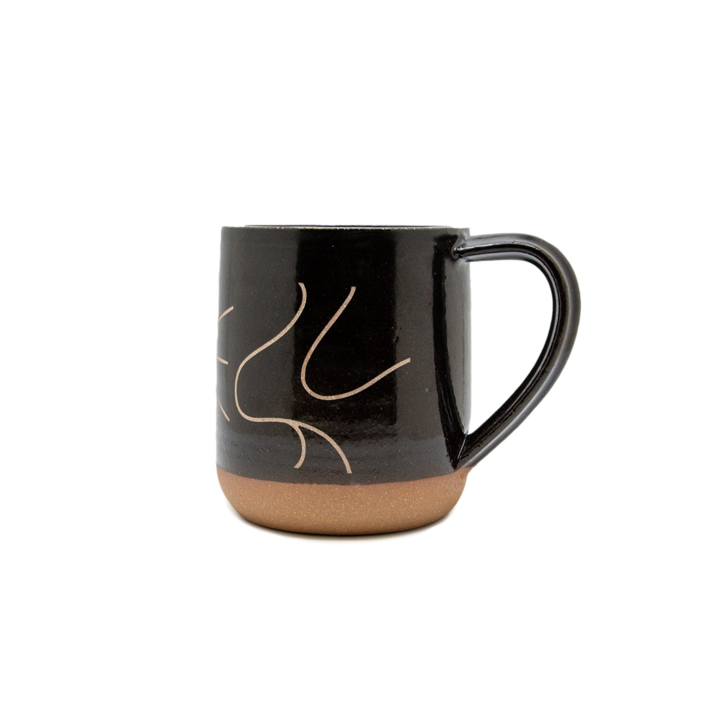 A product phot of the side of the sandcarved mug, the handle to the right side.