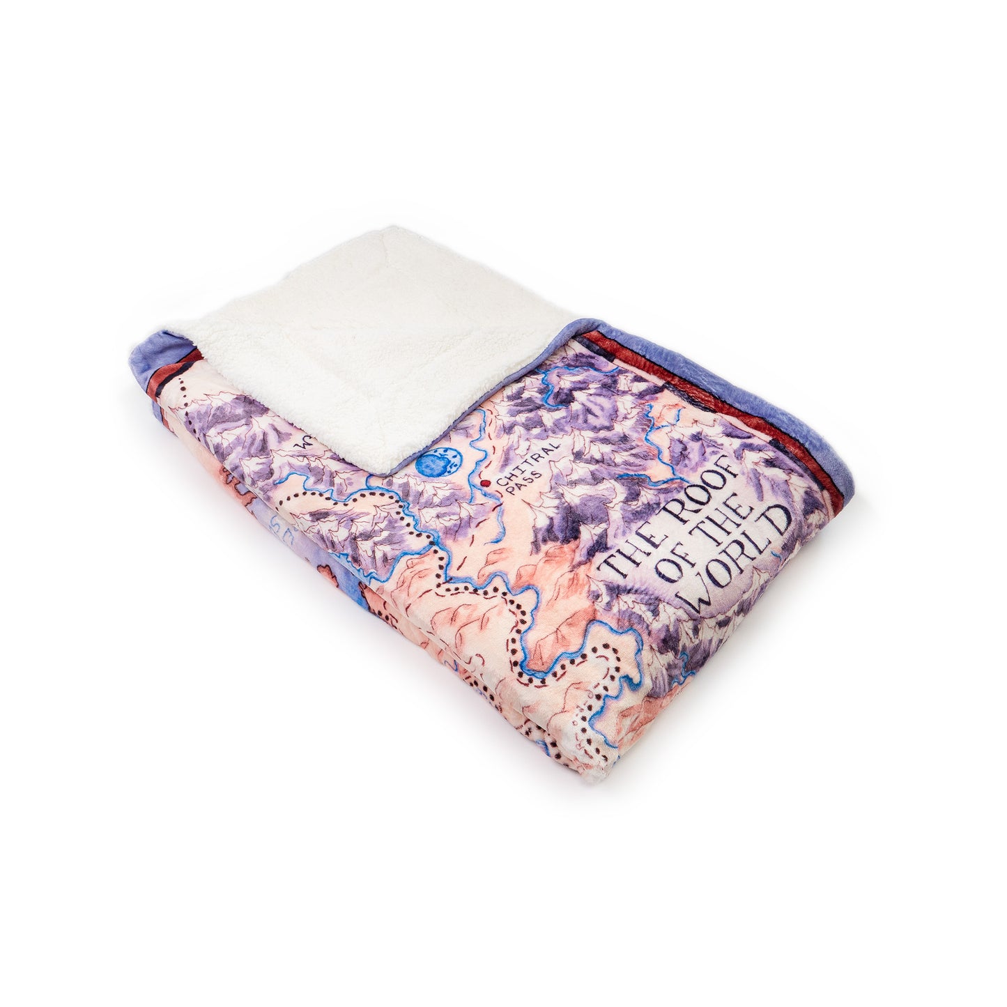 A folded Tortall Map Blanket with one corner folded over to show the white plush opposite side from a diagonal angle to show its extra fluffy thickness.