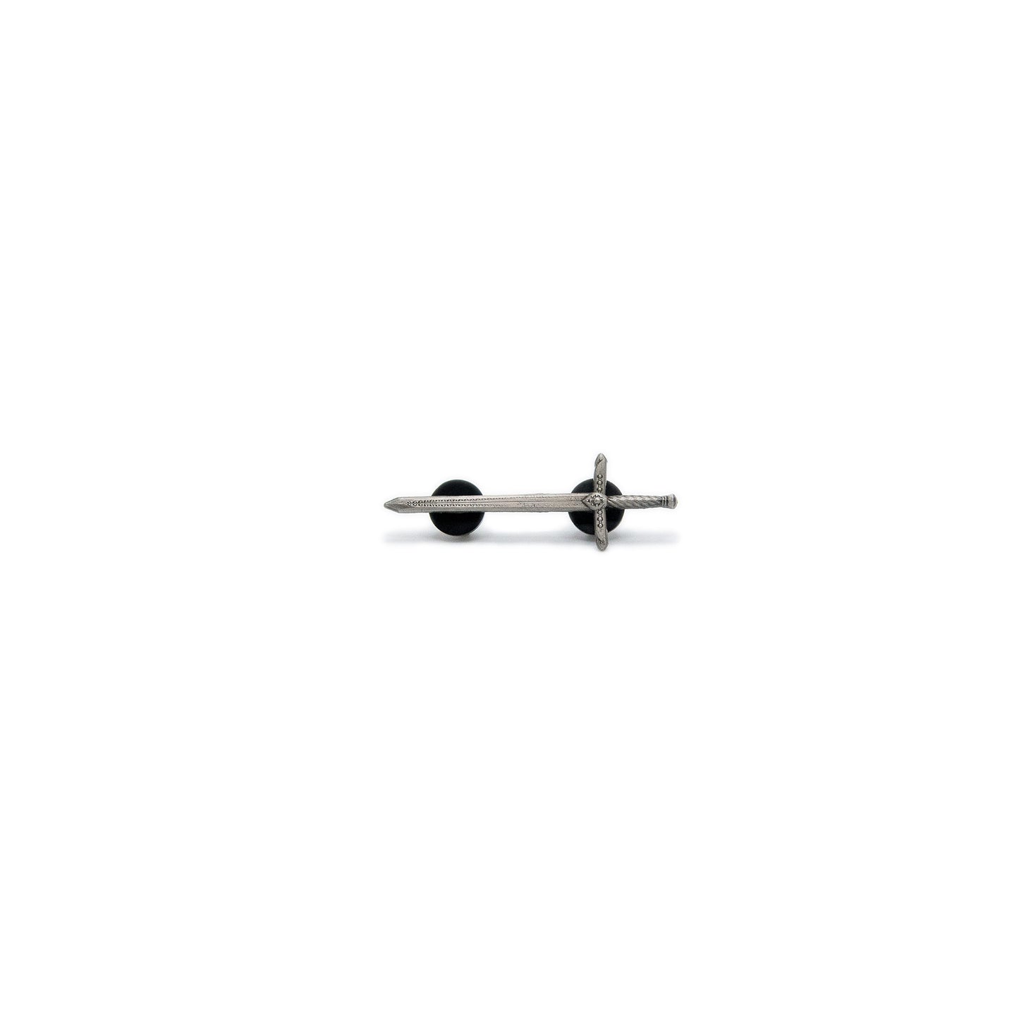 The Lightning Sword Pin laying on its side, supported by its black rubber pinbacks.