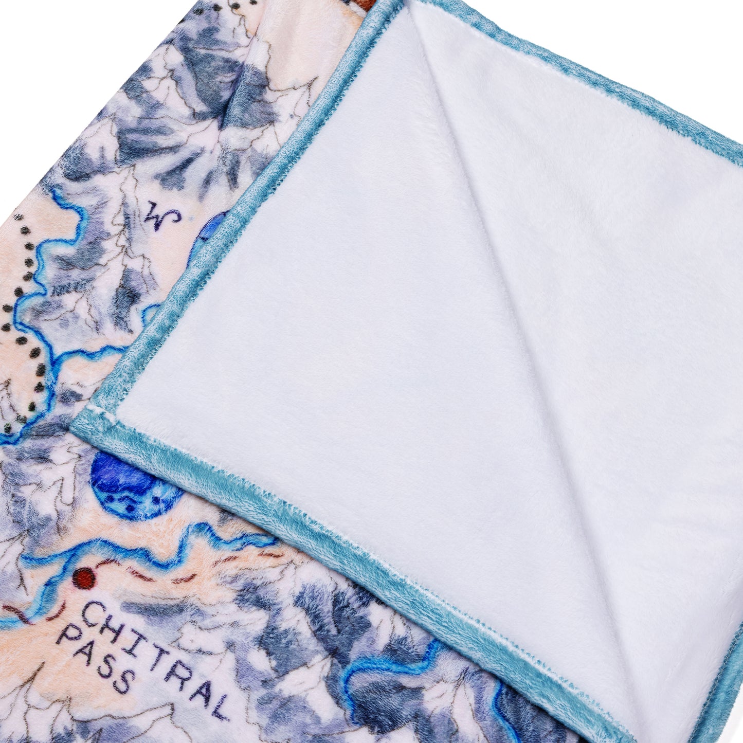 Close up of the white plush lining of the blanket.