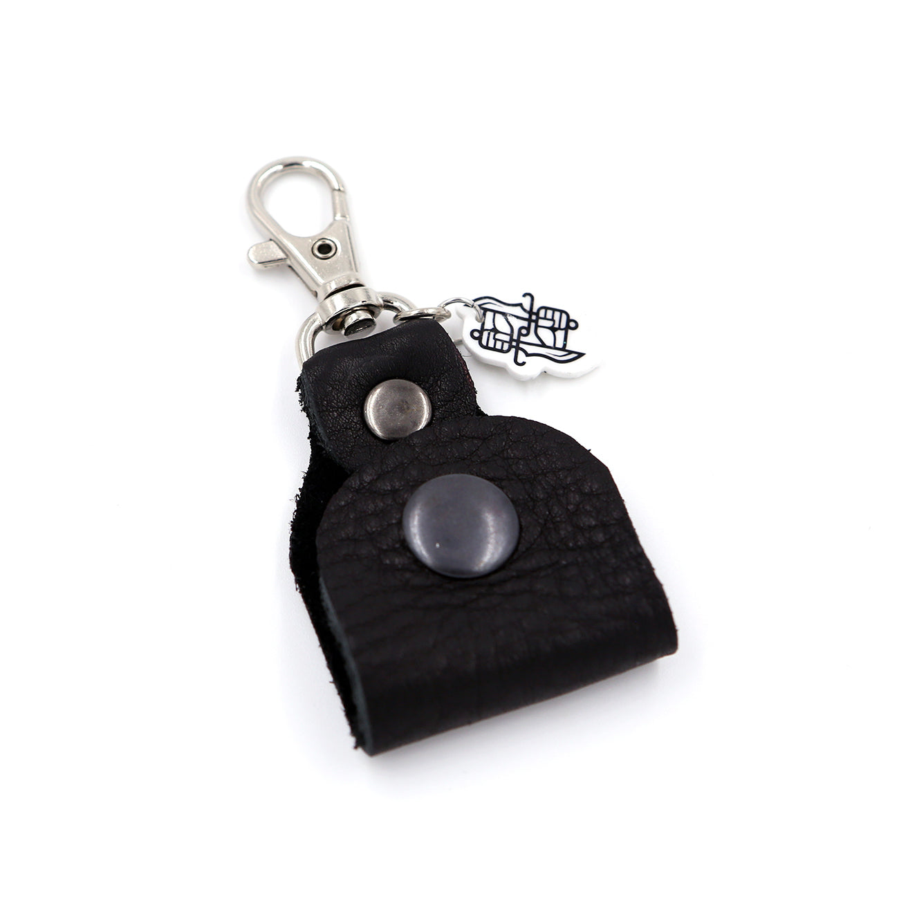 Black leather headphone keepers with Dual Wield Studio logo and silver clasp on white background.
