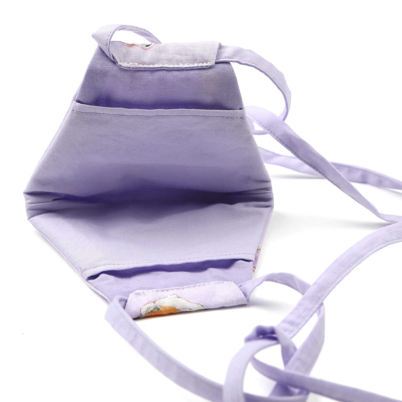 Inside view of purple Bunnerfly mask on white background.