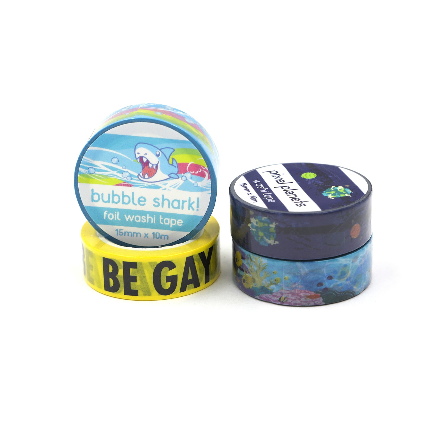 Pile of four different Dual Wield Studio washi tapes on white background.