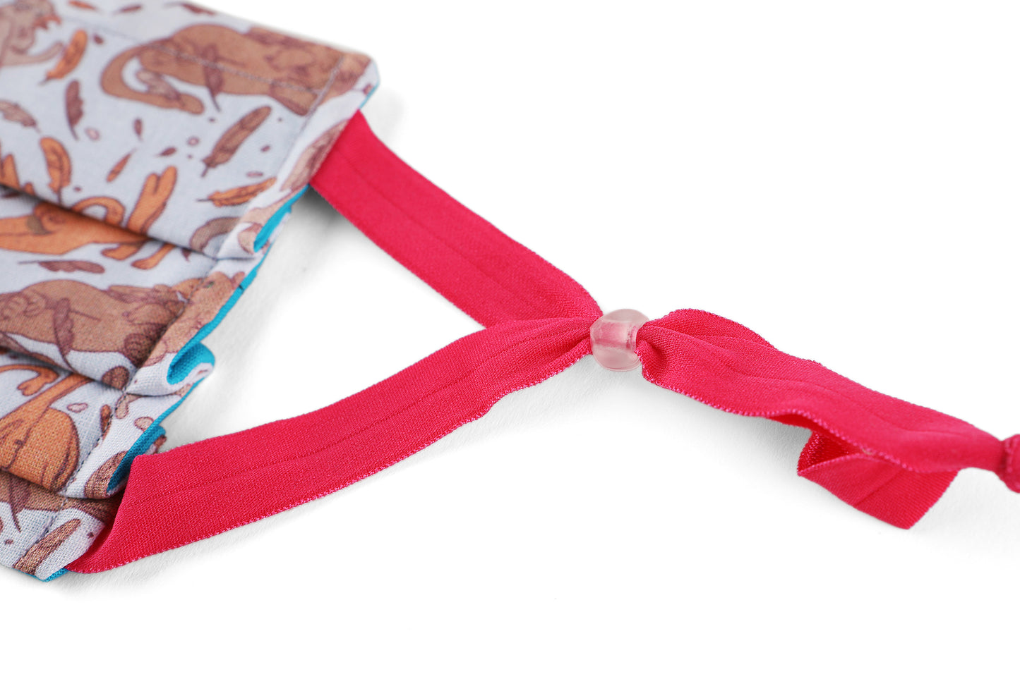 Detail of hot pink adjustable ear loops.