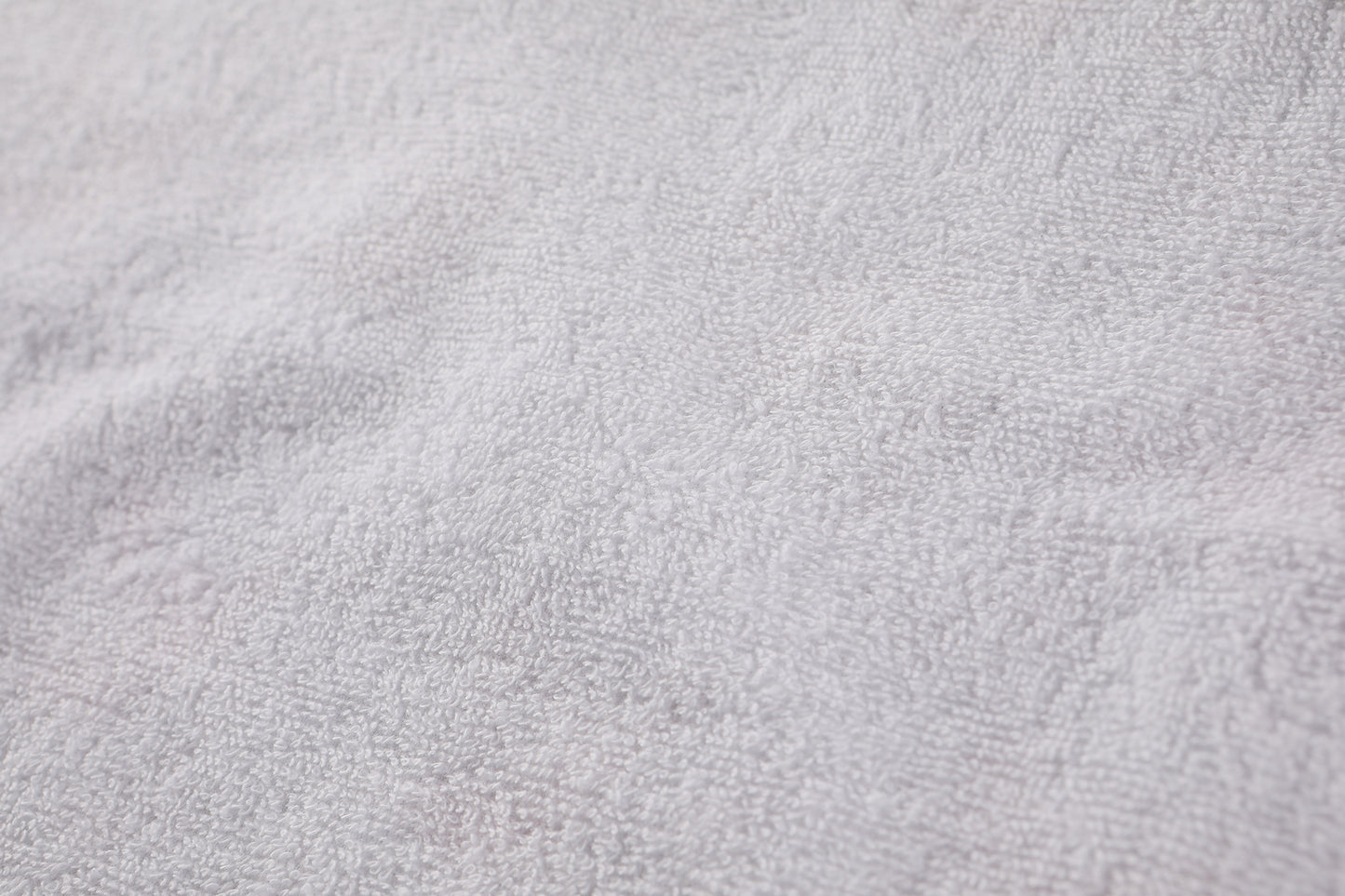 Closeup of white terrycloth lining.