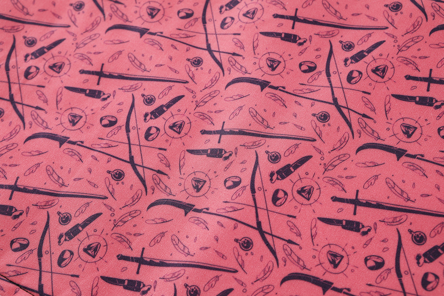 Closeup of weapons and spells tea towel.