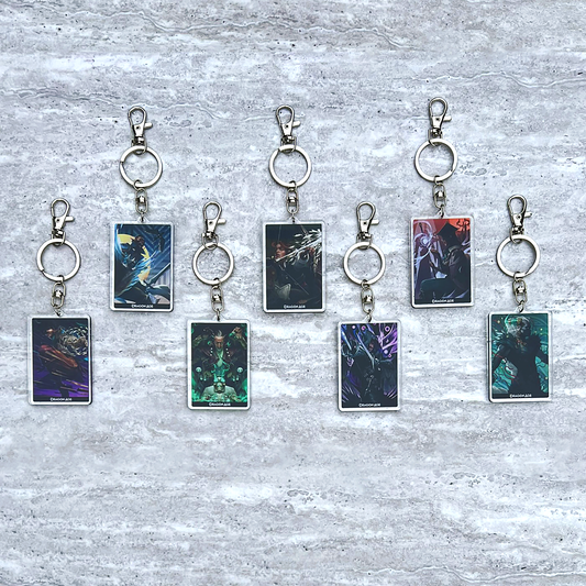 All 7 rectangular Companion Keychains arranged together. The keychains depict the official character art of each companion.