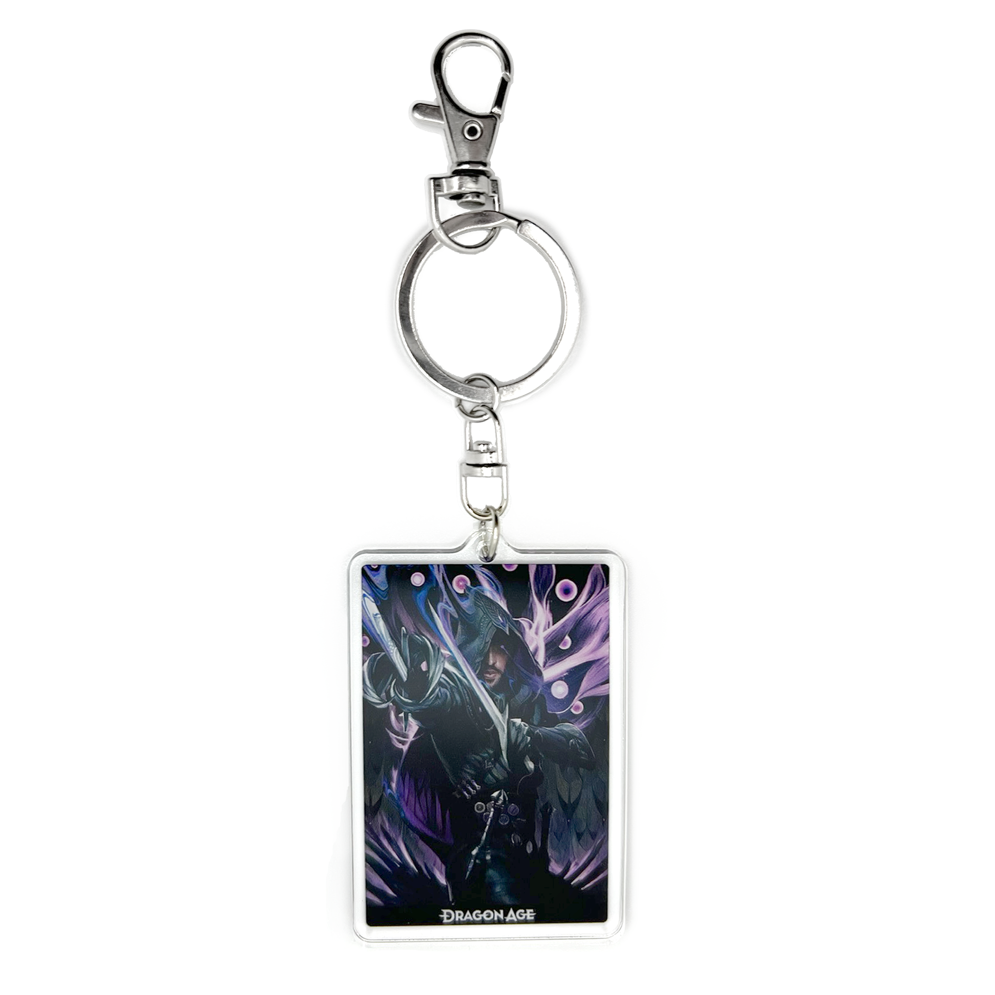 A product photo of the Lucanis acrylic keychain. The keychain is rectangular and depicts an illustration of Lucanis, clad in black, pointing his daggers toward the viewer. He is surrounded by purple wisps and orbs.