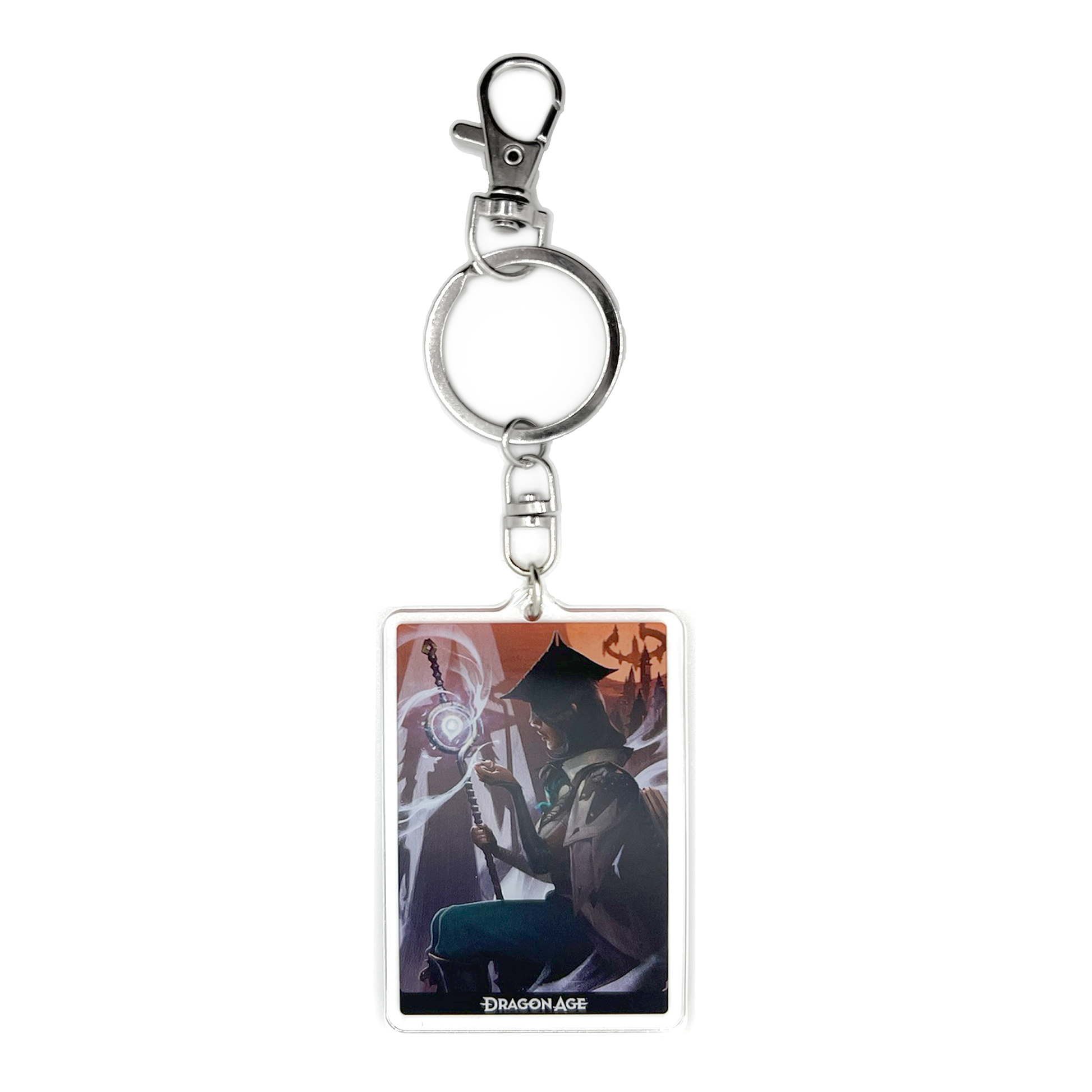 A product photo of the Neve acrylic keychain. The keychain is rectangular and depicts an illustration of Neve, seated facing left, looking at her staff. Ice magic wisps travel from her hand and surround her staff. City details of Minrathous loom in the background.