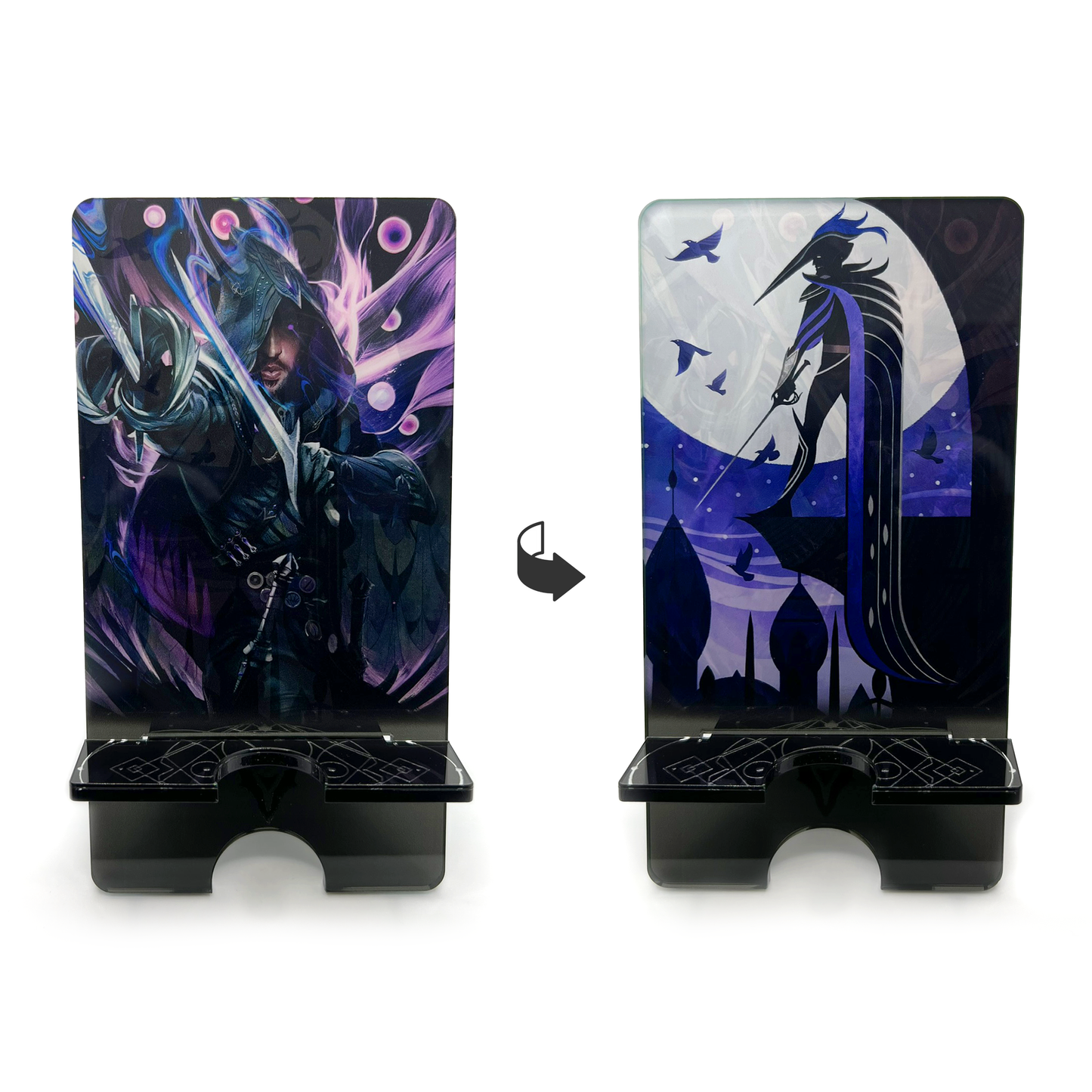 A product photo of both sides of the Lucanis acrylic standee. It depicts an illustration of Lucanis, clad in black, pointing his daggers toward the viewer. He is surrounded by purple wisps and orbs. The opposite side of the standee depicts the Antivan Crows faction art. A purple and black silhouette of an assassin stands on a building ledge overlooking Antiva. A murder of crows flies above the scene.