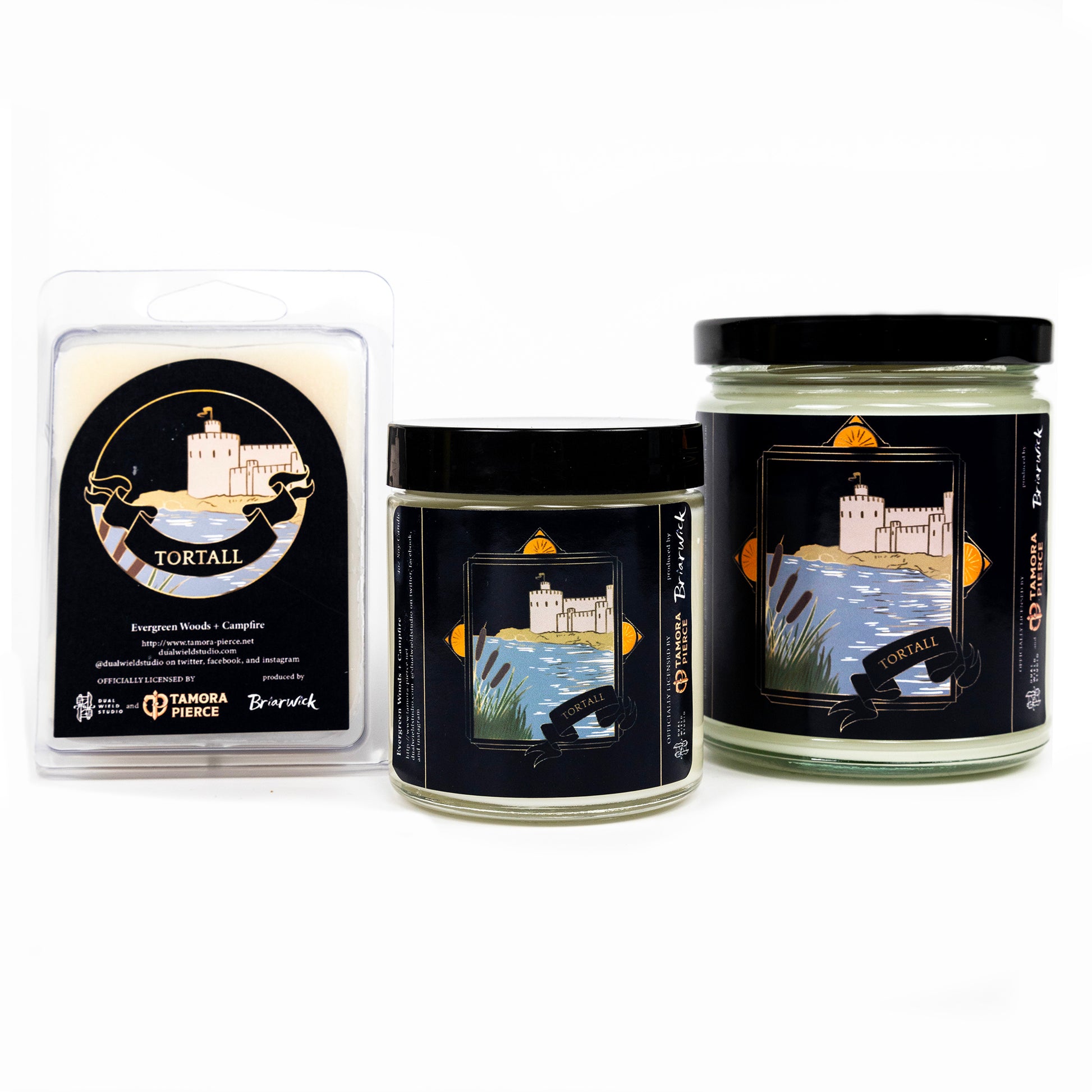 Full set of both Tortall candles and wax melts, all with cream wax. The label illustration shows a castle nestled by a river. 