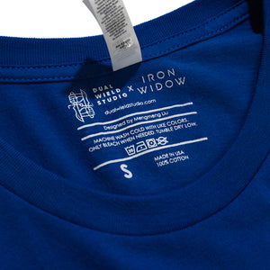 Closeup of Dual Wield Studio x Iron Widow and shirt care in white on the inner shirt back.