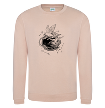 Load image into Gallery viewer, Tan sweatshirt with white illustration of Dustspinners, constellations, and chains swirling around Faithful the cat