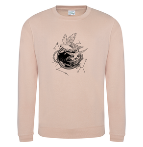 Tan sweatshirt with white illustration of Dustspinners, constellations, and chains swirling around Faithful the cat
