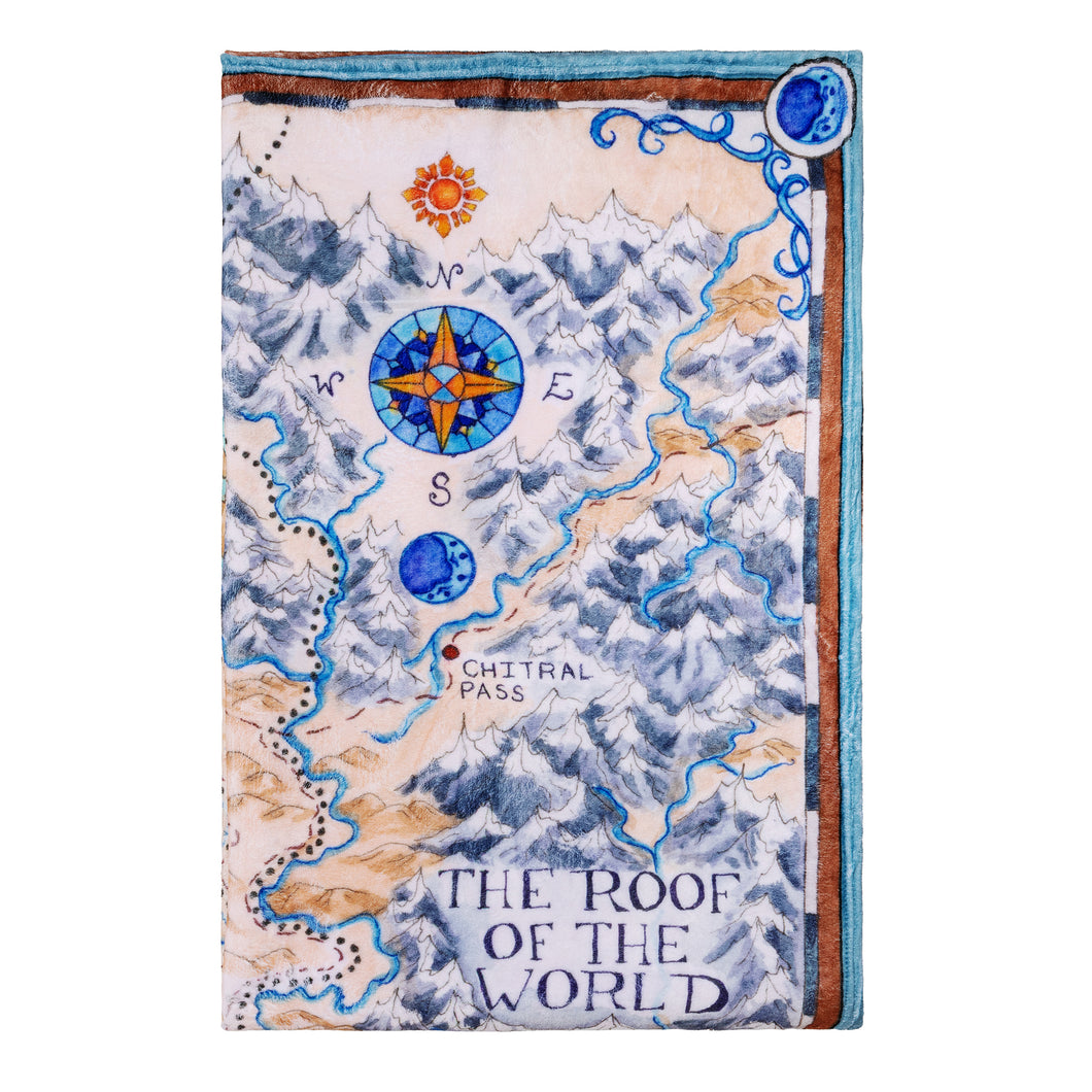 Tamora Pierce Plush Tortall Map blanket folded into a rectangle with the top-right corner of the illustration visible.