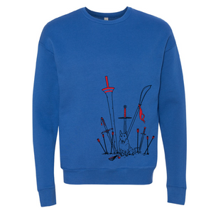 Blue sweatshirt, showing red and black outlined weapons embedded in the ground around a sitting Jump the dog.