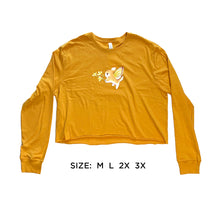 Load image into Gallery viewer, Goldenrod Bunnerfly long sleeve crop tee in more saturated color sizes (M, L, 2X, 3X) laid flat on white background.