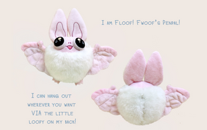 Front and back view of pastel pink Floof the Bat Plush with text that reads: "I am Floof! Fwoof's penpal! I can hang out wherever you want via the little loopy on my back!"
