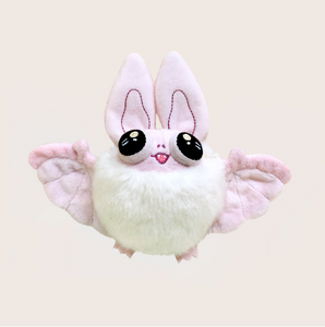 Front view of pastel pink Floof the Bat Plush.