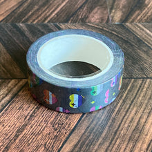Load image into Gallery viewer, The Pride Hearts Washi Tape is printed with patterned hearts, colored in as different striped pride flags. Multicolored sparkles are printed throughout.