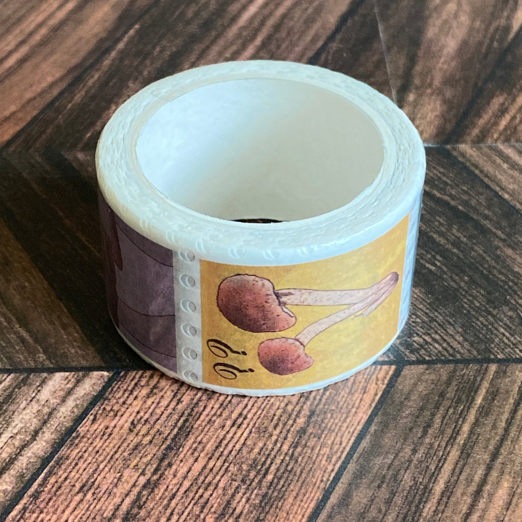 The Mushroom Stamp washi tape is perforated to mimic real stamps featuring illustrations of different types of mushrooms.