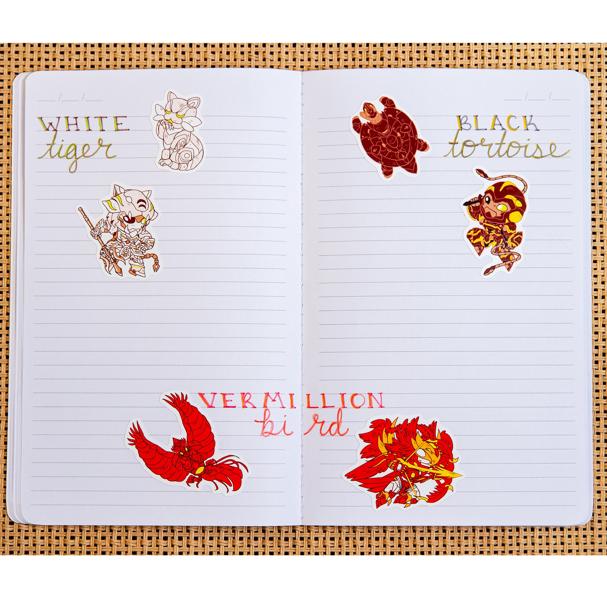 All six stickers from the Iron Widow: Mecha Sticker Set used in a lined undated planner with their names written in cursive. Names read: "White Tiger, Black Tortoise, and Vermillion Bird."