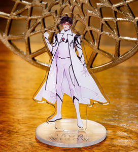 Shimin acrylic standee with warm wood and gold decoration in background.