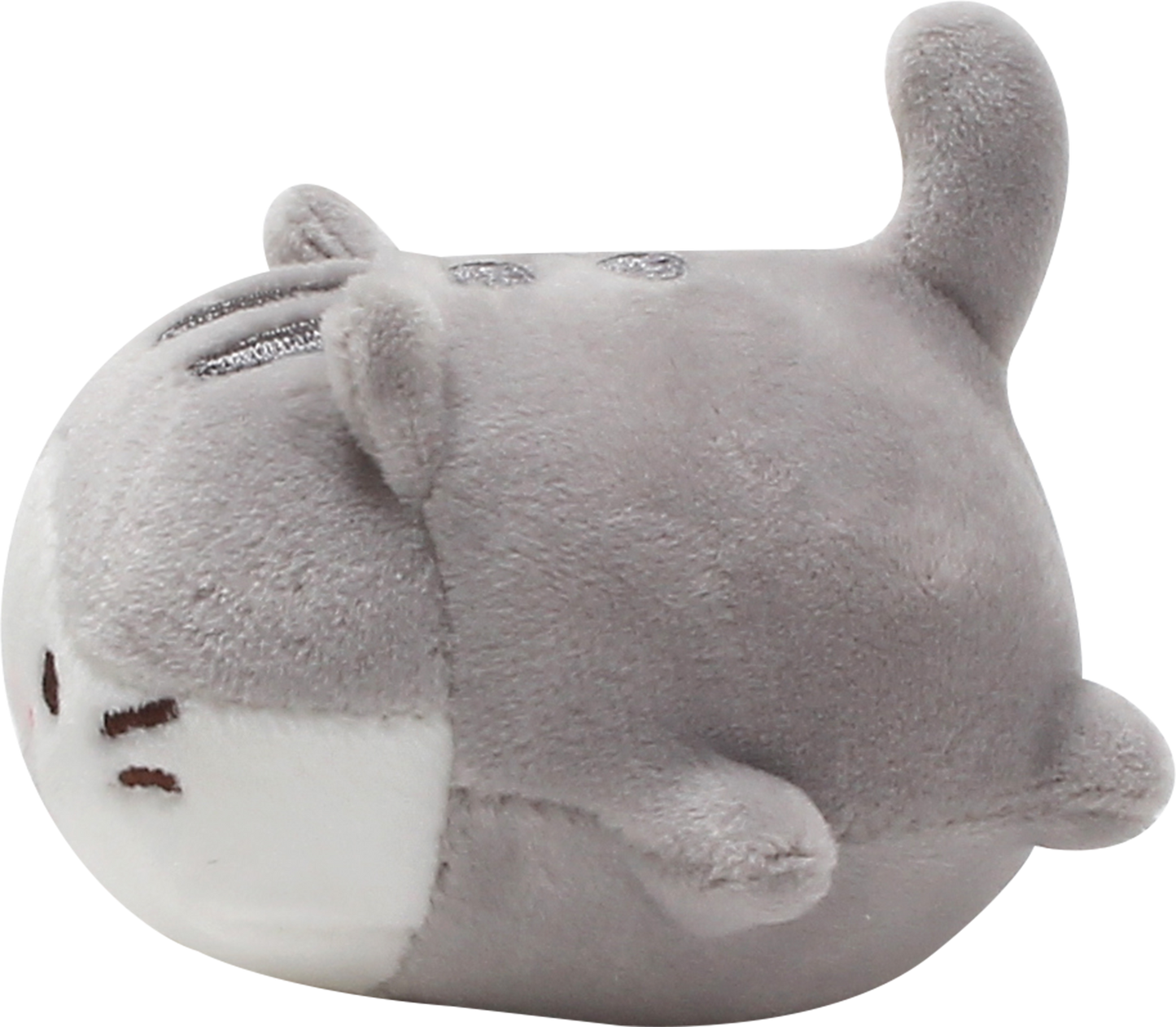 Side view of Mackerel, a grey and white cat plush.
