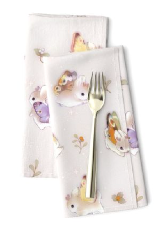 A fork placed on Woodsy Jackalopes table napkins on white background.