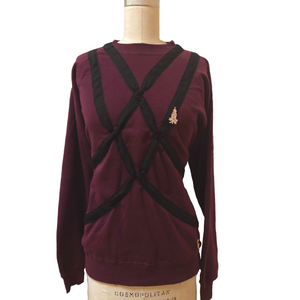 Front view of Shibari Sweater - maroon with black wraps - on dressform.