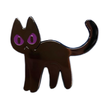 Load image into Gallery viewer, Standing black cat enamel pin with purple eyes, frowning on white background.