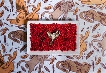 Load image into Gallery viewer, Tamora Pierce Keladry Crown Sparrow pin in a white bowl filled with red beads on Tamora Pierce: Griffin Scarf background.