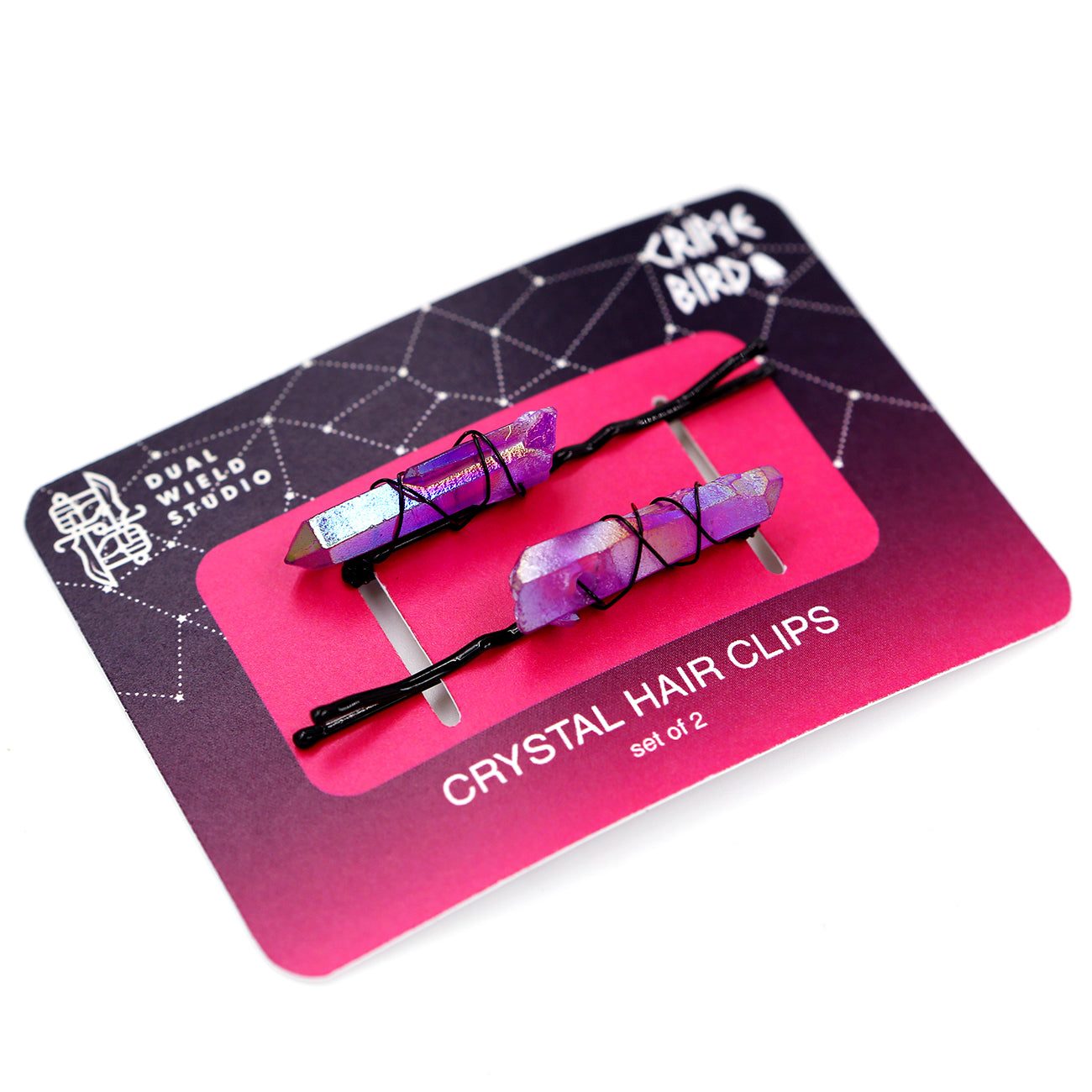 Set of 2 purple crystals on black pins on backing card white background.