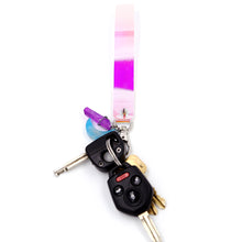 Load image into Gallery viewer, Holographic keystrap with silver clasp and blue moon charm with various keys attached on white background.