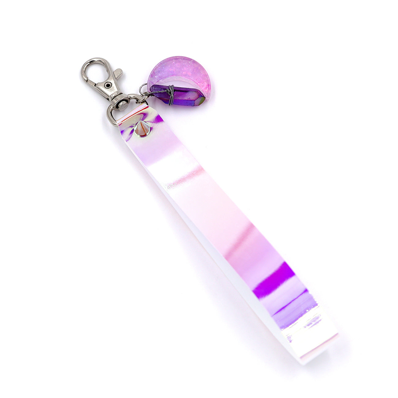 Holographic keystrap with silver clasp and pink moon charm on white background.