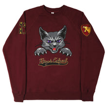 Load image into Gallery viewer, Dark red varsity sweatshirt with stylized hissing grey cat head with purple eyes, and paws with claws out. Sweatshirt front text reads: &quot;Razor Edged.&quot;