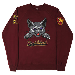 Dark red varsity sweatshirt with stylized hissing grey cat head with purple eyes, and paws with claws out. Sweatshirt front text reads: "Razor Edged."
