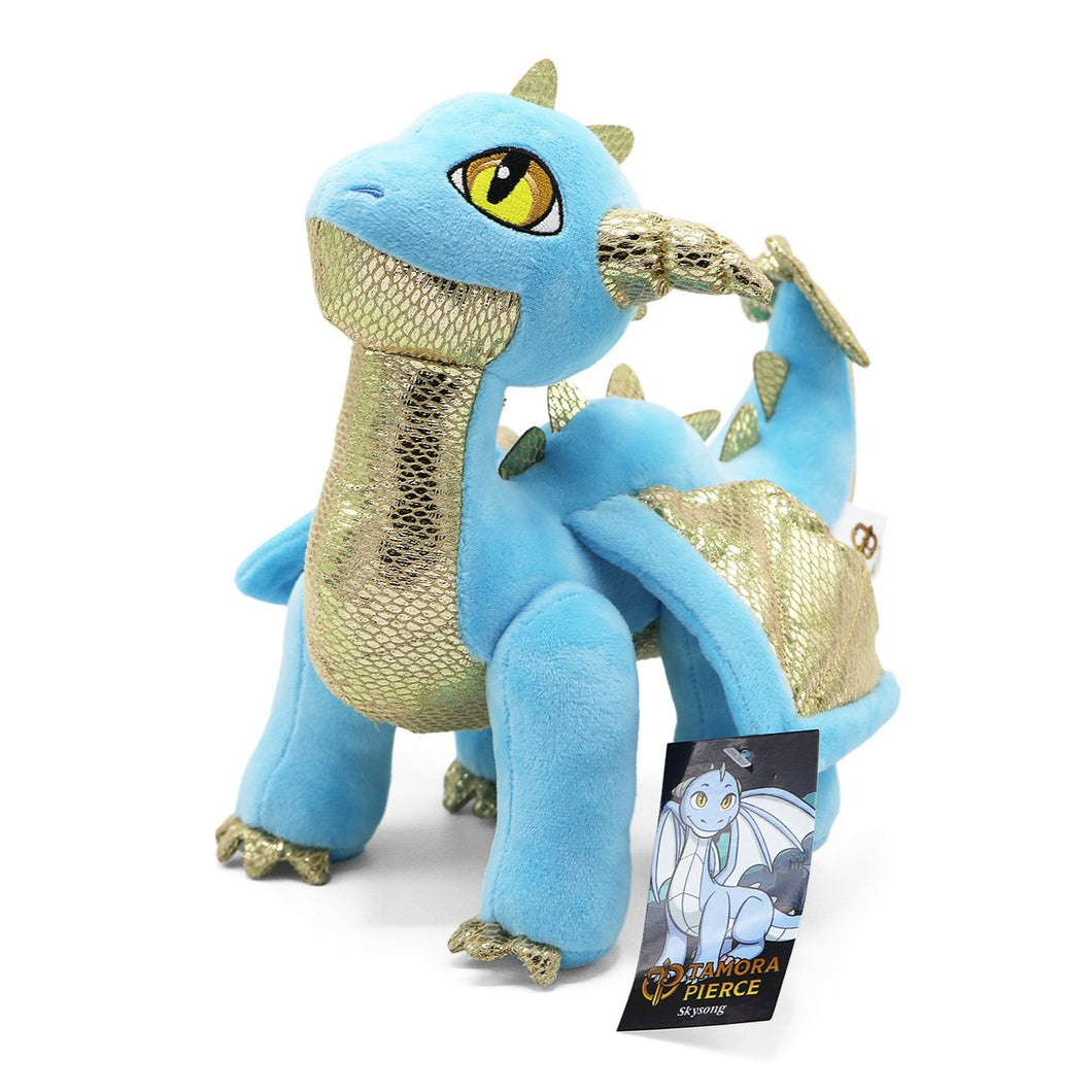 Light blue and metallic gold detailed Skysong dragon plush stands, looking upward, on white background.