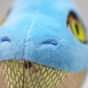 Closeup of blue embroidered nostrils on Skysong dragon plush.
