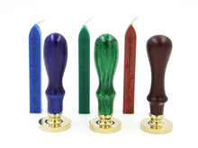 Load image into Gallery viewer, Three wax seals next to each other with their corresponding sealing wax in blue, green, and brown.
