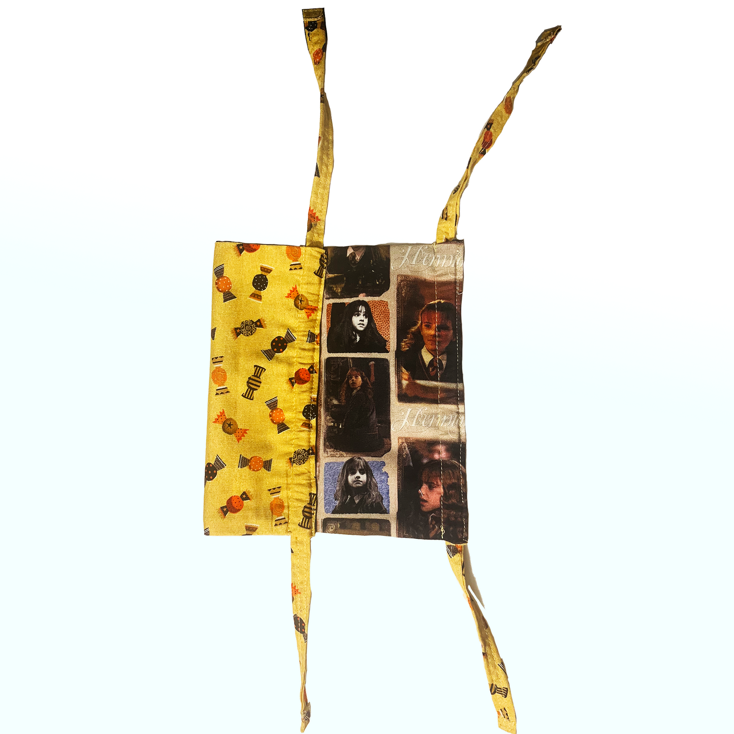 Yellow halloween candies pattern mask and Hermione Granger pattern mask together on white background.