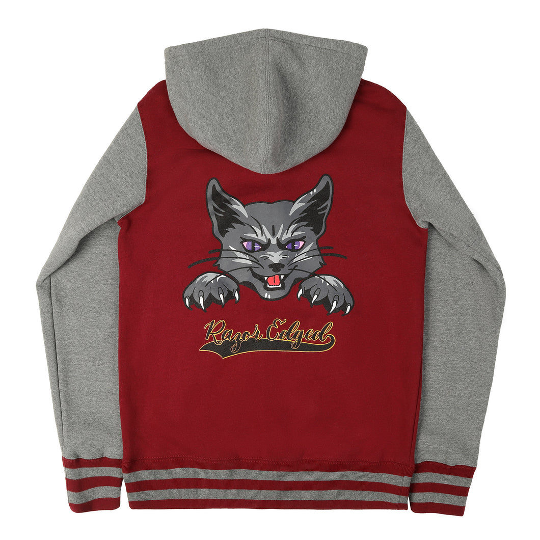 Back of red and grey varsity hoodie with stylized hissing grey cat head with purple eyes, and paws with claws out. Sweatshirt back text reads: 