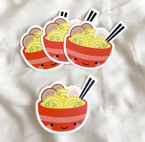 Four ramen stickers together on a white cloth background.