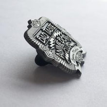 Load image into Gallery viewer, Side view of bad taste antique silver pin on white background.