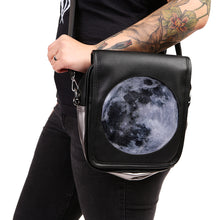 Load image into Gallery viewer, Model wearing Moon Ita Bag as a crossbody on white background.