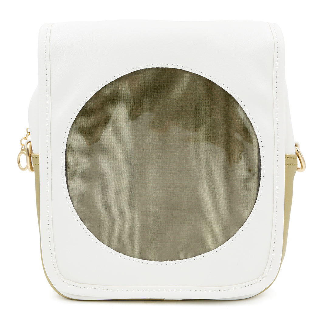 White Sun Ita Bag with gold accents and window insert in its round front window.