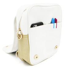 Load image into Gallery viewer, The Sun Ita Bag with front flap open, revealing a phone and markers in its front pockets.