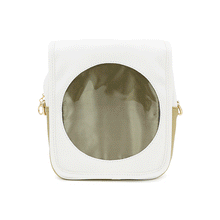 Load image into Gallery viewer, Gif image of white Sun Ita Bag with different window inserts switching out.
