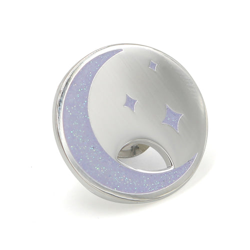 Sparkly lavender and silver moon charm pin on white background.
