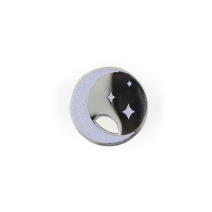 Sparkly lavender and silver moon charm pin on white background.